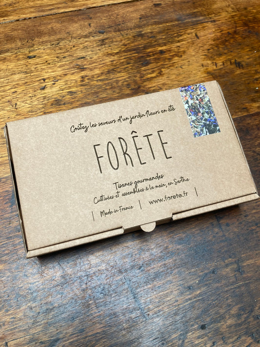 un coffret cadeau de 10 infusettes de la tisane Forête Mélisse / Basilic Thaï